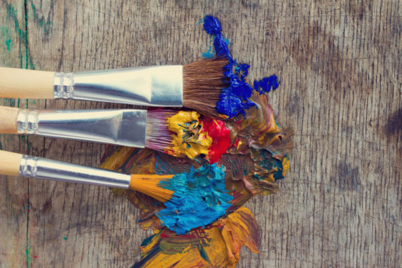 Download Artistic Brushes in a Colorful Paint - Paint Collection